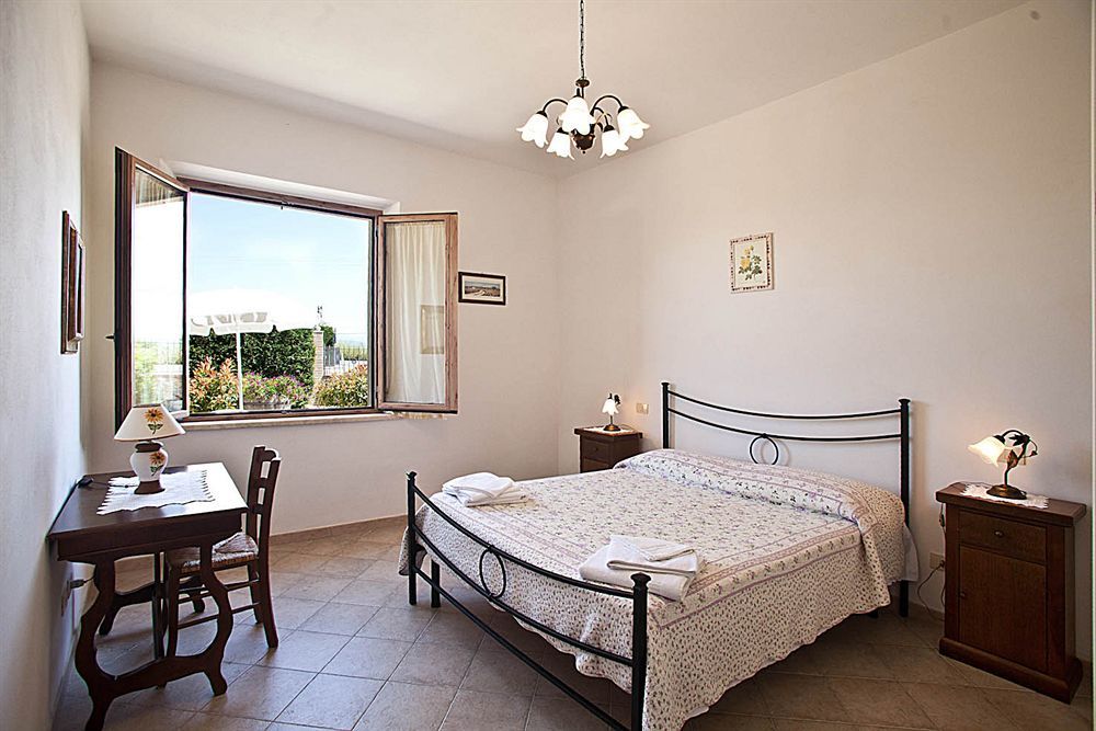 Casa Vacanze Santa Caterina Asciano Exterior foto